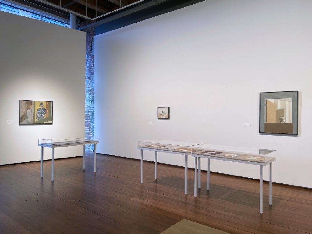 installation view with small vertical window showing